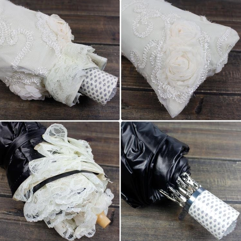 Showcase of lolita parasol lace flounce design with dimensional floral patterns and rose appliques catching natural light, highlighting premium lace craftsmanship and sweet lolita aesthetic