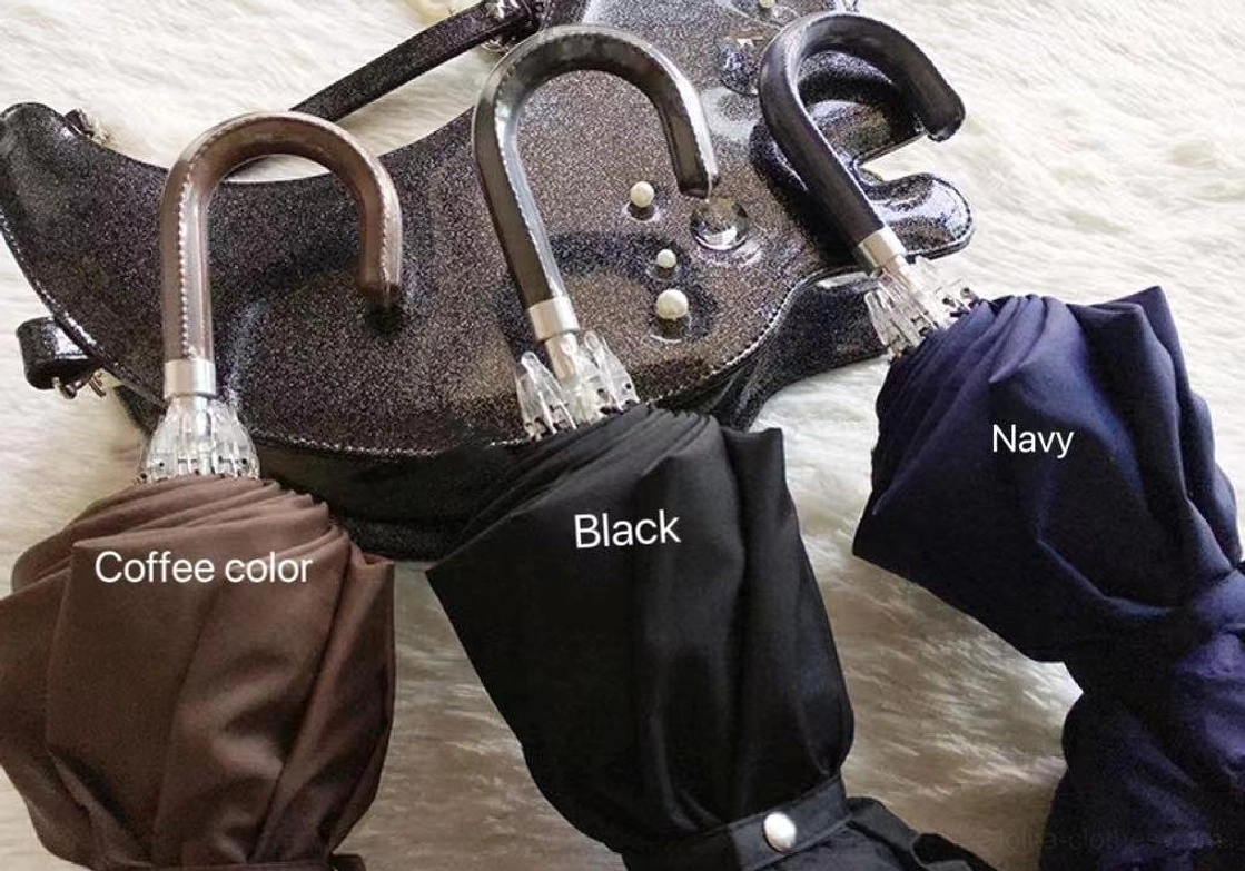 Multiple Lolita parasol color variants displayed together showing range of pink navy blue black ivory coffee shades