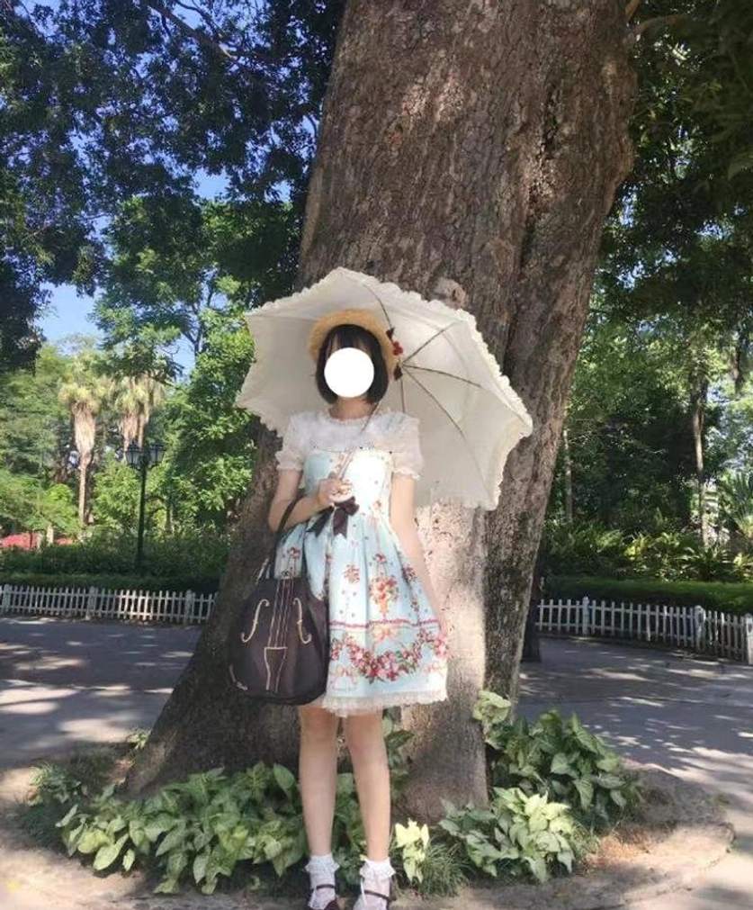 Lolita parasol tea party and social event occasion featuring parasol as statement accessory for gatherings