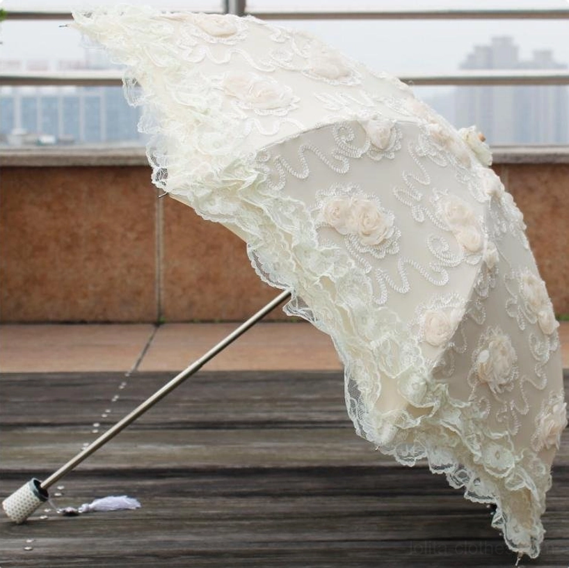 Unfolded lolita parasol displaying full octagonal canopy with intricate lace border and floral embroidery, perfect for sweet lolita and classic lolita coordinate styling