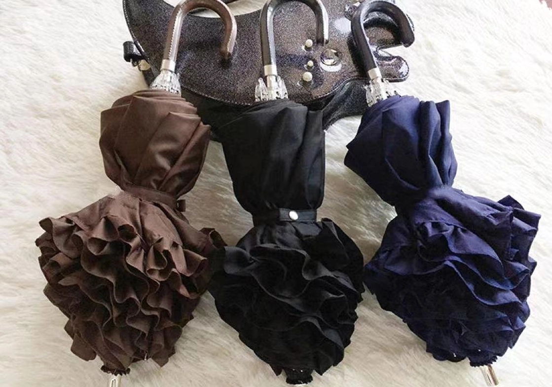Lolita ruffled parasol UV protection fabric detail showing PONGEE cloth quality and sun-protective material construction