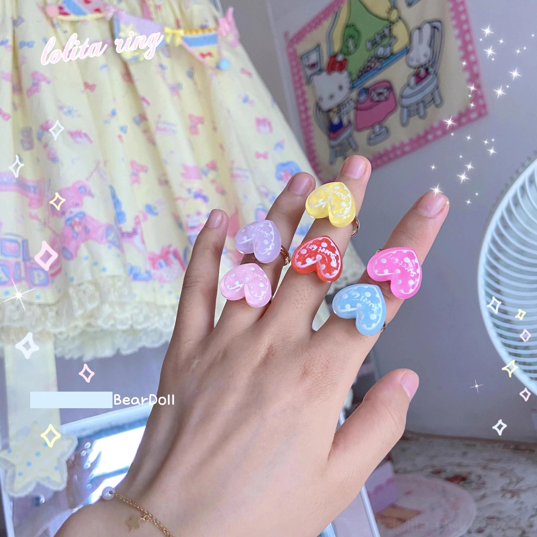Kawaii Lolita pastel heart-shaped resin adjustable ring worn on female hand with sweet Lolita dress backdrop