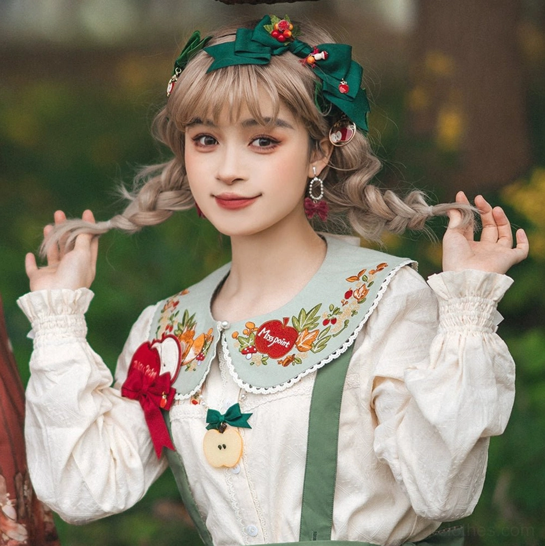 Multiple lolita peter pan collars side by side comparison all four colors beige red green black embroidery details close-up view