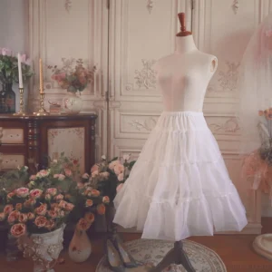White Lolita petticoat three-quarter front view displaying smooth waistband layered fluffy tulle tiers full silhouette