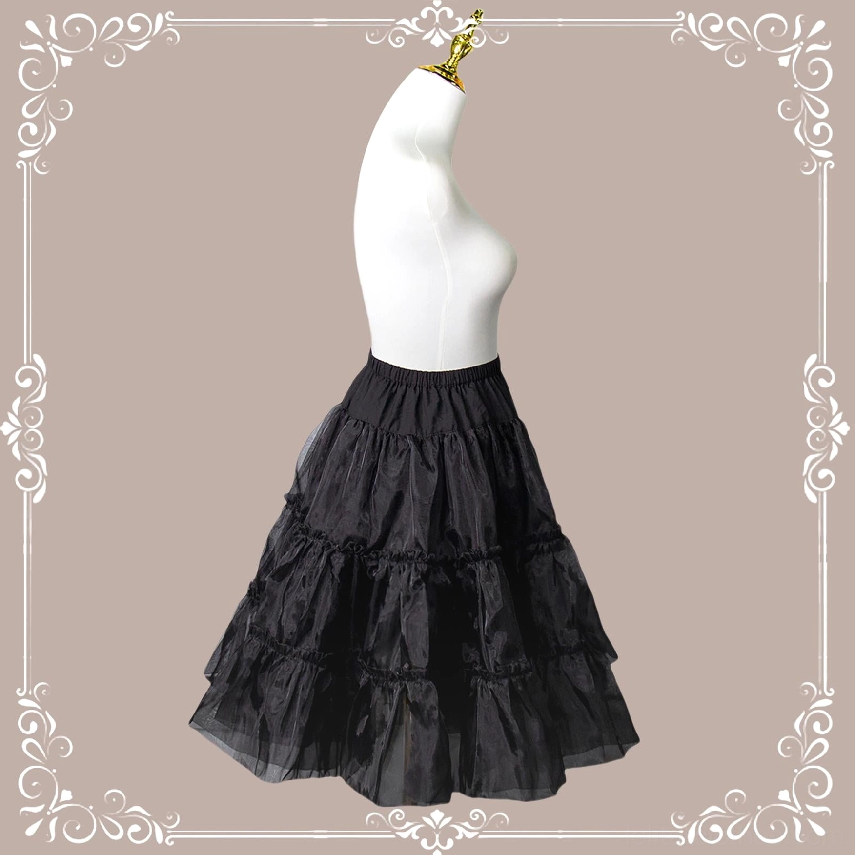 Black tiered Lolita petticoat side three-quarter view dress form vintage ornate frame backdrop showing sheer tulle fabric ruffled hem silhouette