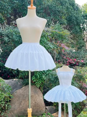 Comparison two white lolita petticoats blue lolita dress side view mannequins outdoor garden puffiness demonstration