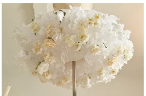 fluffy layered organza lolita petticoat overhead view decorated with cream yellow roses artistic arrangement