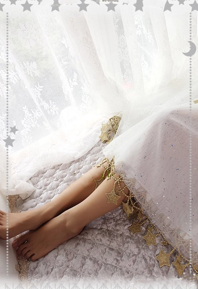 Lolita petticoat construction detail showing premium tulle fabric quality and gold star lace construction