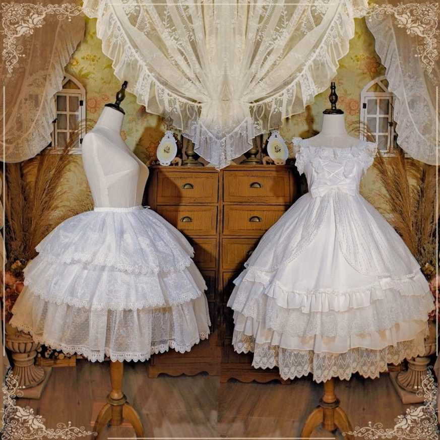 Lolita petticoat and matching bridal gown front display on dress forms in vintage bedroom setting