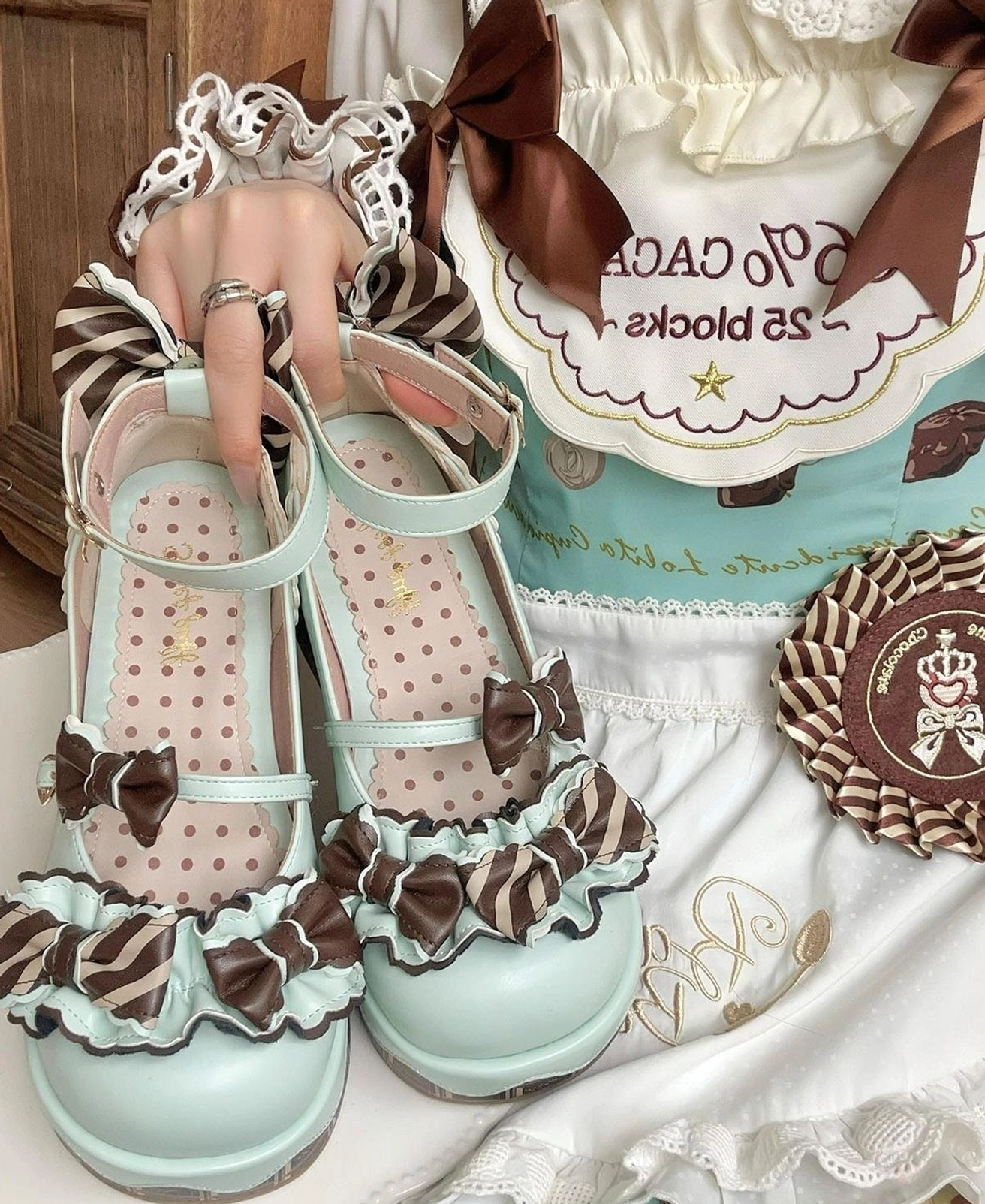 Lolita platform shoes heel bowknot embellishment detail view showcasing cute ornament design and heel area construction