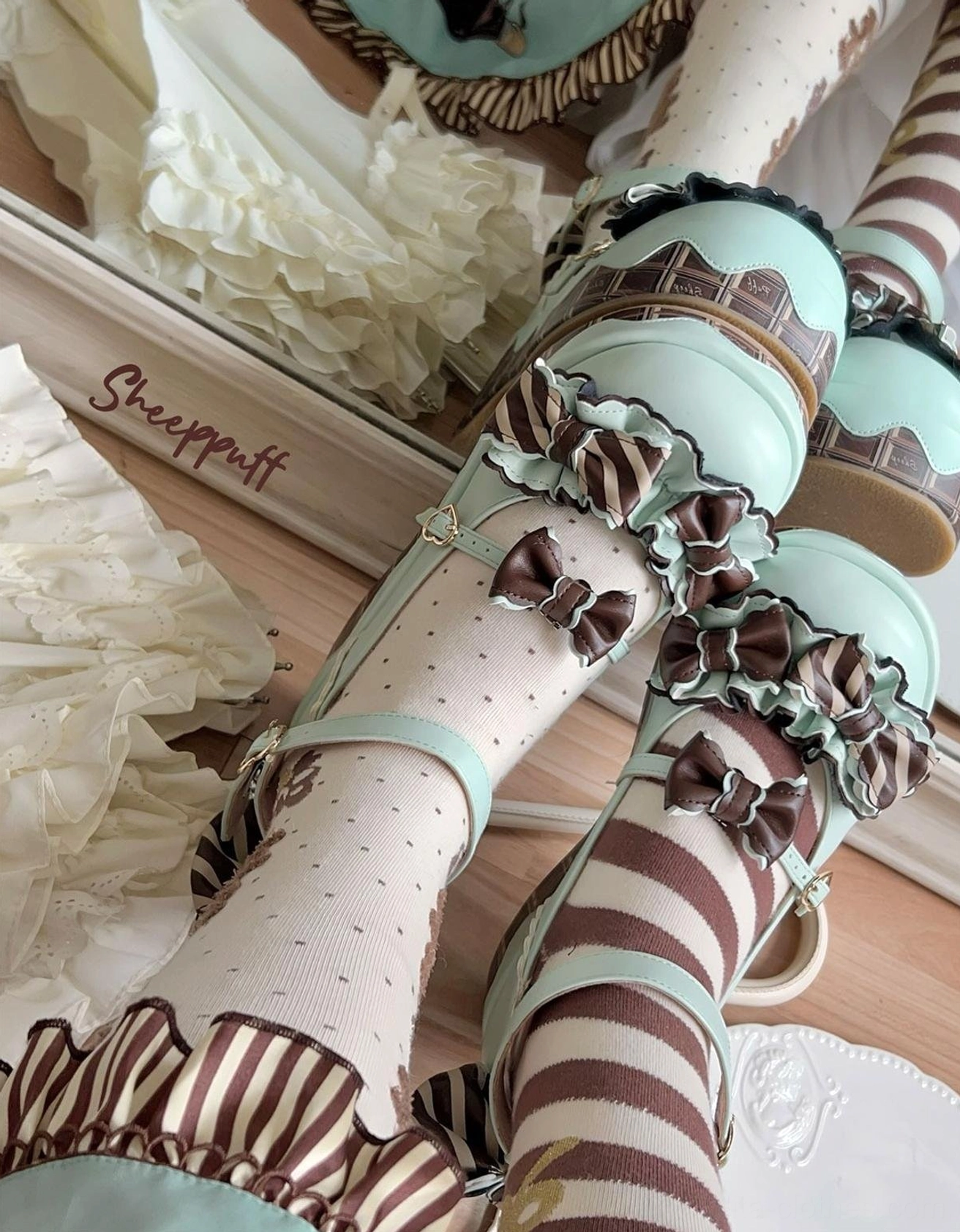 Lolita platform shoes strawberry chocolate colorway detail showing pink tone and chocolate-striped sole design aesthetic