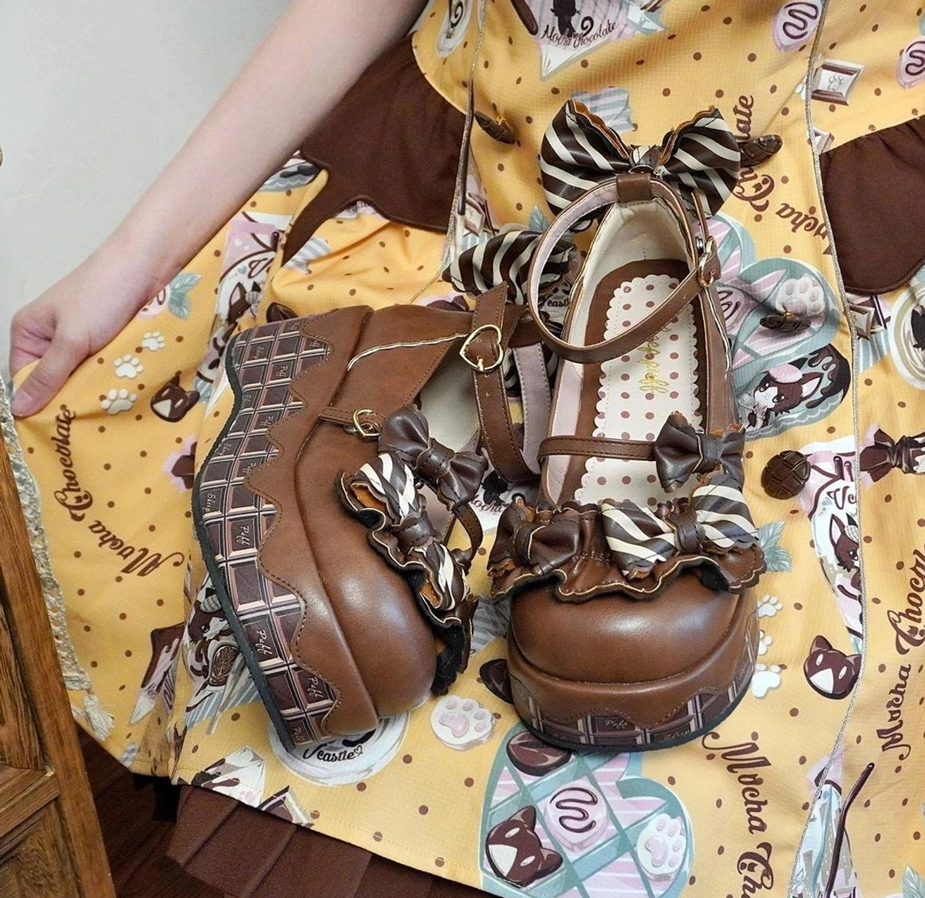 Sweet lolita platform shoes paired with complementary lolita coordinate showing outfit styling suggestions and color harmony with dress
