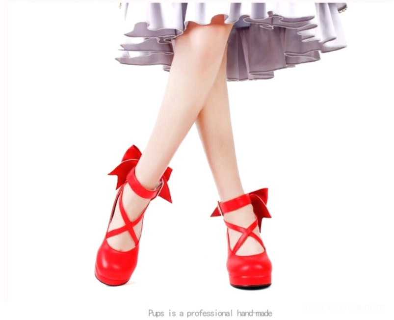 Lolita princess platform heels in shining white patent leather with glossy finish, crossover ankle buckle straps, and large decorative back bow - detailed product photography