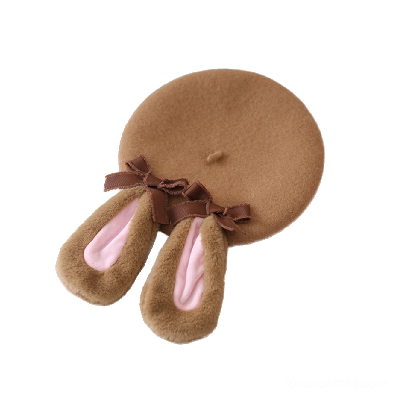 Flat lay top-down view of camel-pink plush rabbit ear beret with dual brown satin bows and fuzzy ears circular composition
