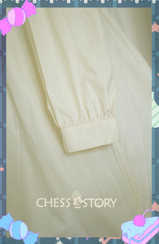 Close-up sleeve detail of cream Lolita raincoat showing straight buttoned cuff neat stitching and smooth matte fabric texture