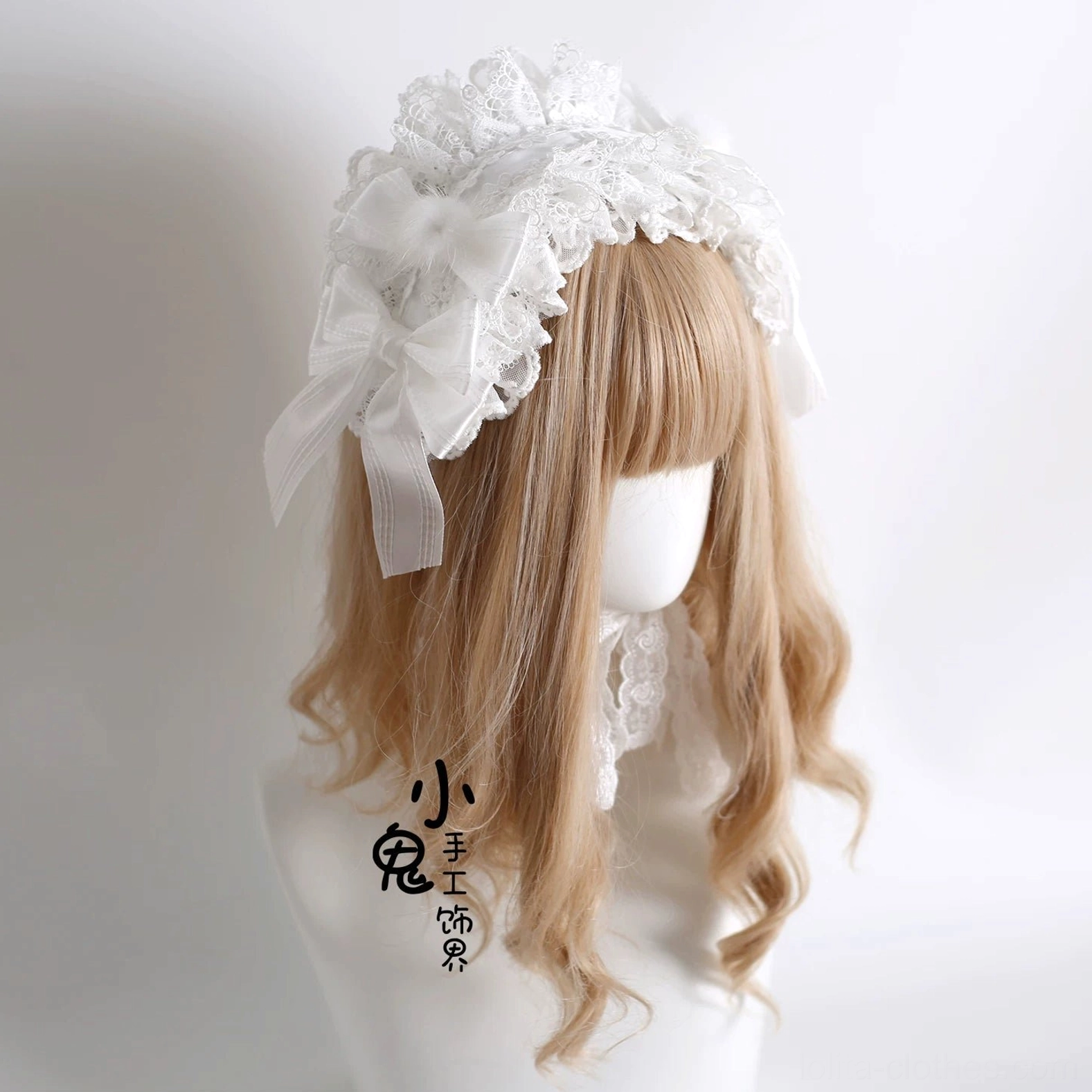 Lolita wide ruffled lace headband with matching satin bow and coordinating neck accessory, front three-quarter mannequin view