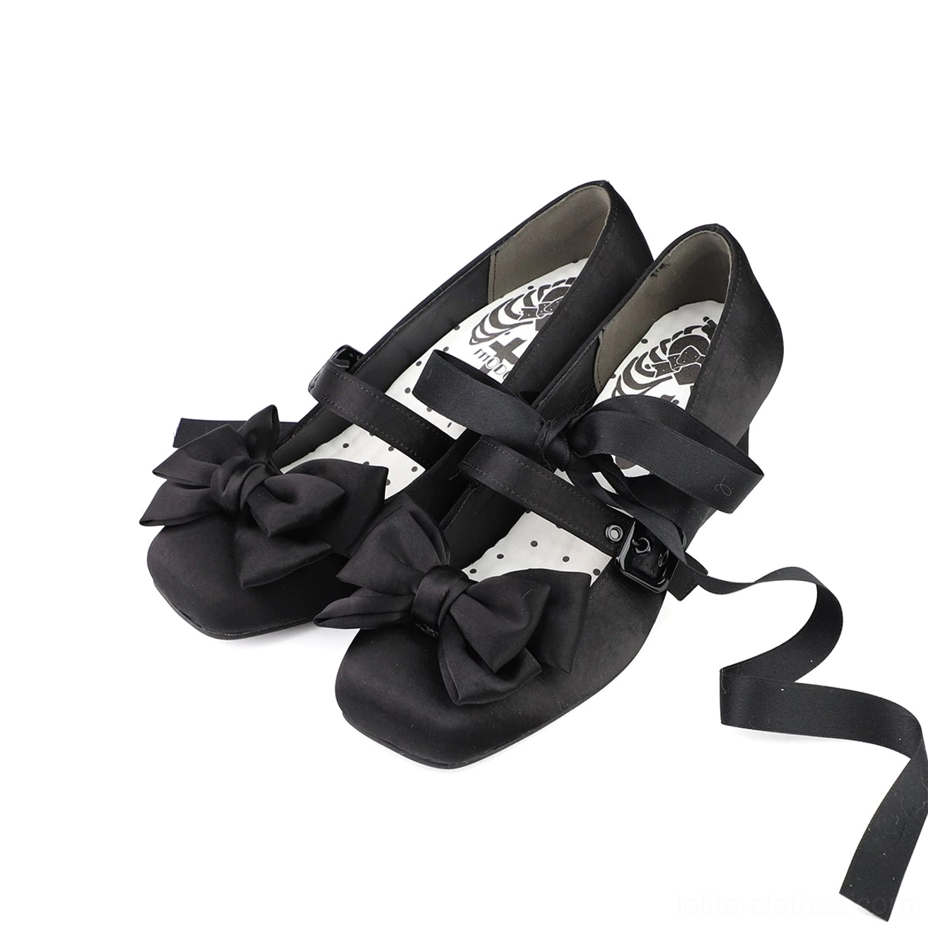 Black lolita satin square toe Mary Jane shoes with oversized satin bow and adjustable ankle buckle strap on elegant minimalist background