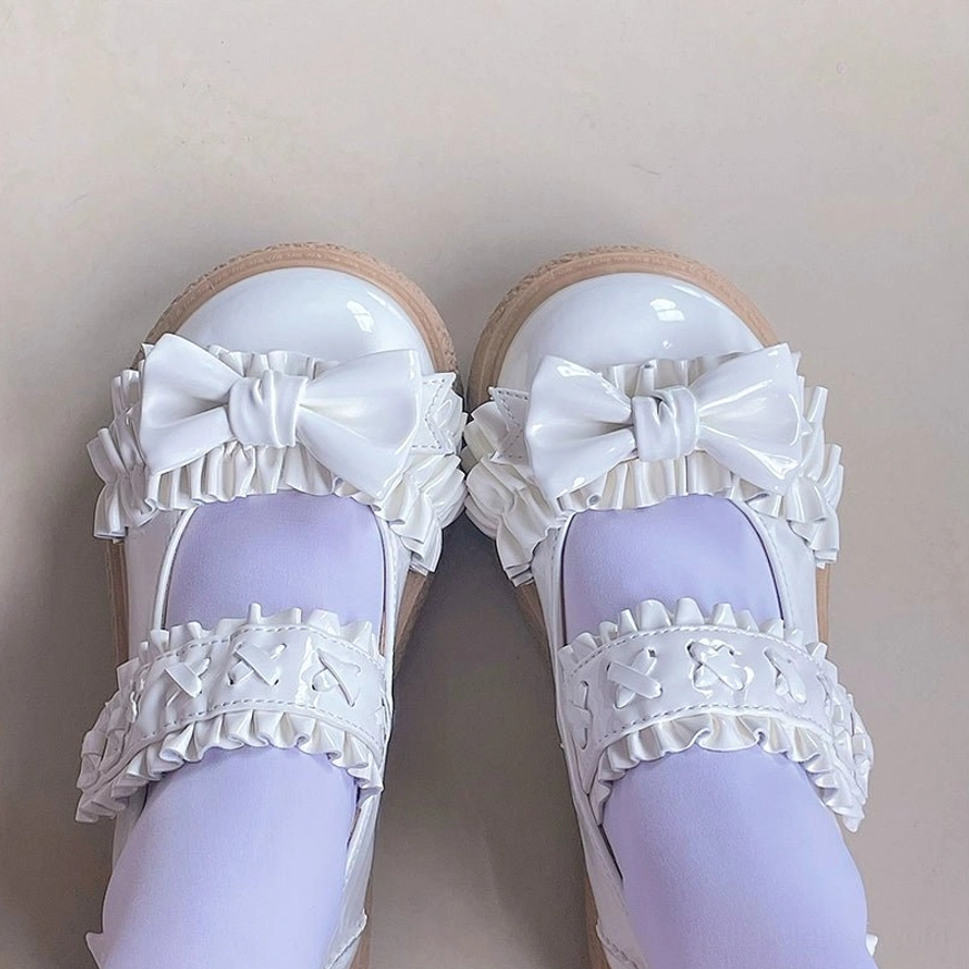 Lolita shoes worn with elaborate ruffled socks and coordinated leg wear combinations demonstrating proper proportional sock pairing techniques for Lolita aesthetics