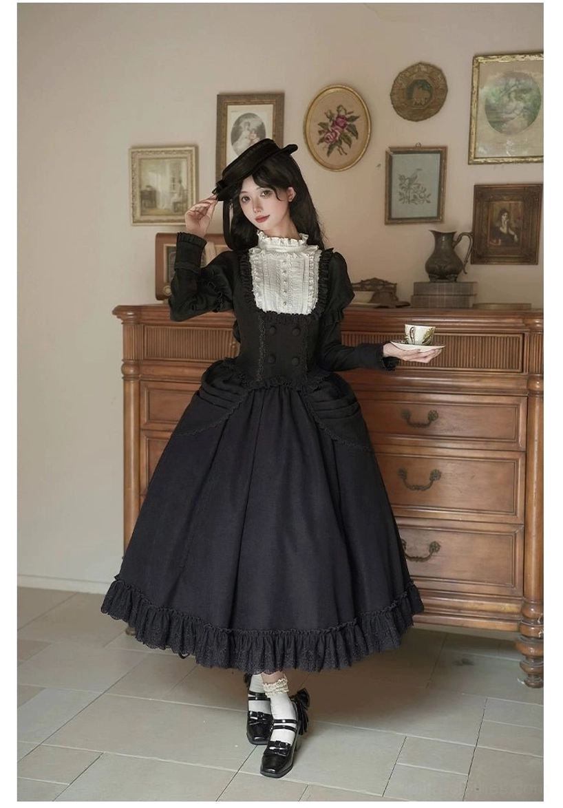 Product detail of lolita short skirt showing elastic waistband construction, fixed drape panel stitching, and ruffled skirt hem with white underlayer