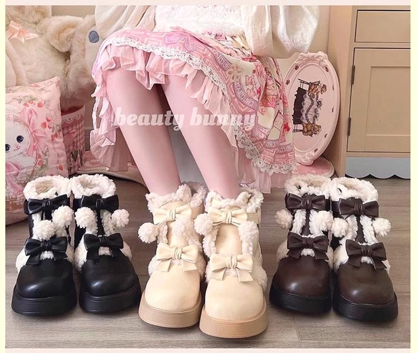 On-foot display of lolita snow boots worn with sweet pink lolita skirt in cozy bedroom with cute throw pillows
