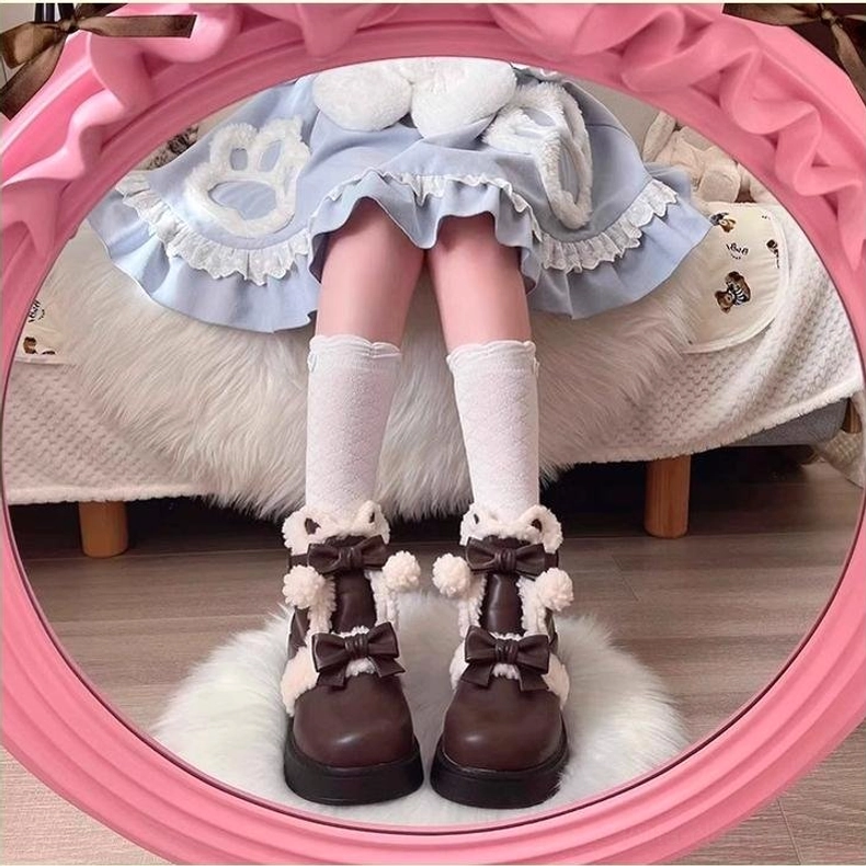 Lolita snow boots side profile chunky heel platform shearling collar decorative details