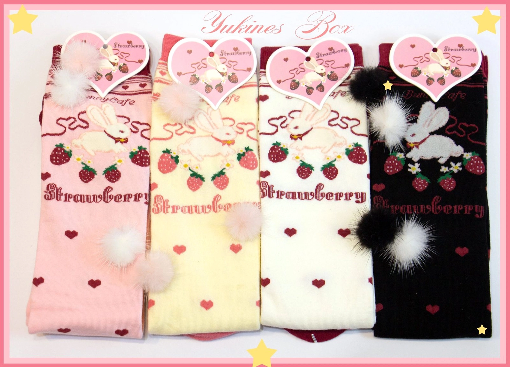 Lolita strawberry bunny socks flat lay product shot four color variants with pom-pom hang tags no background