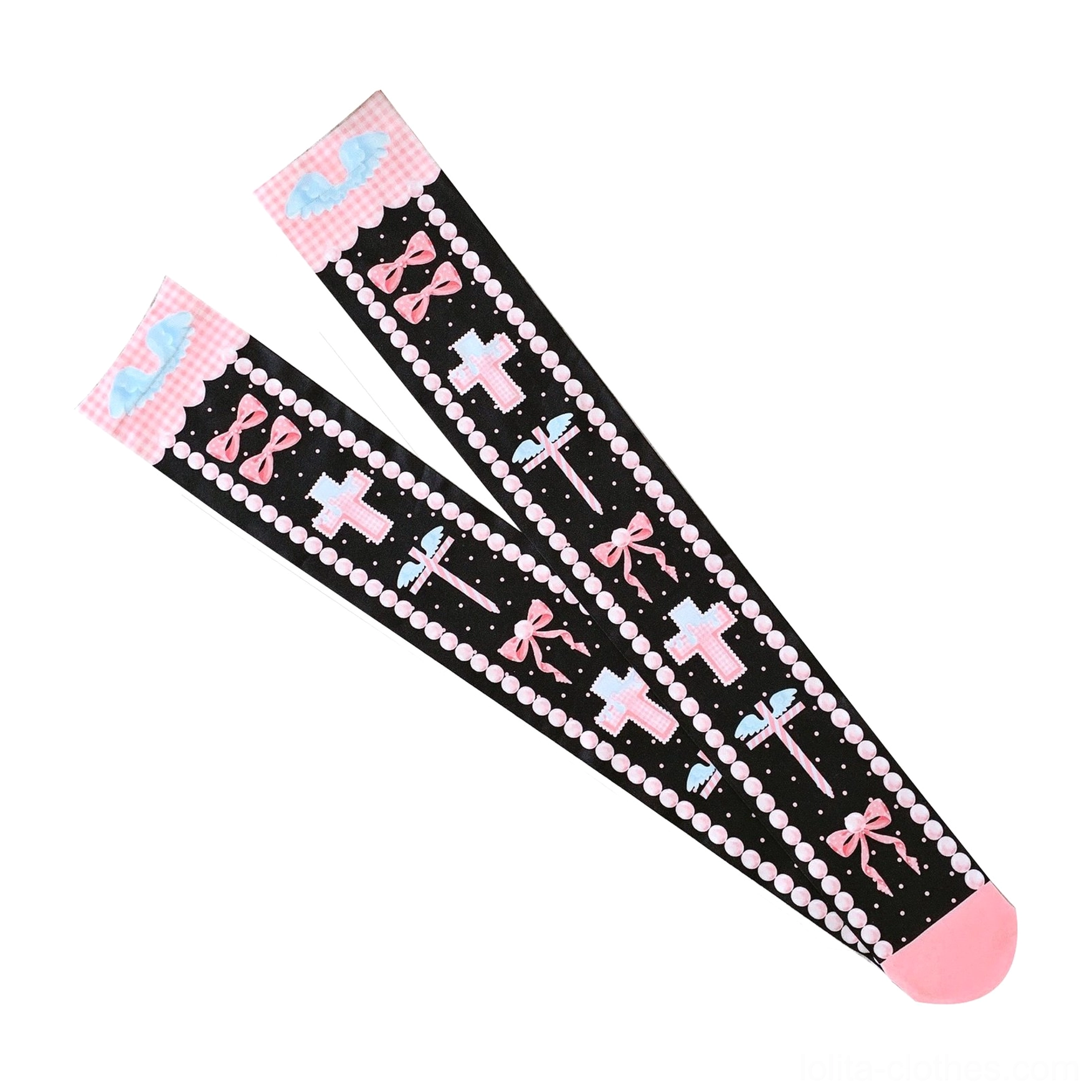 Overhead flat lay detail view of black and pink lolita thigh high stockings showing cross bow dot edging and cuff details, velvet texture