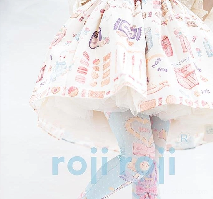 Partial view of Lolita printed stockings and skirt lower back angle showing pastel dessert gift box and heart bow motifs