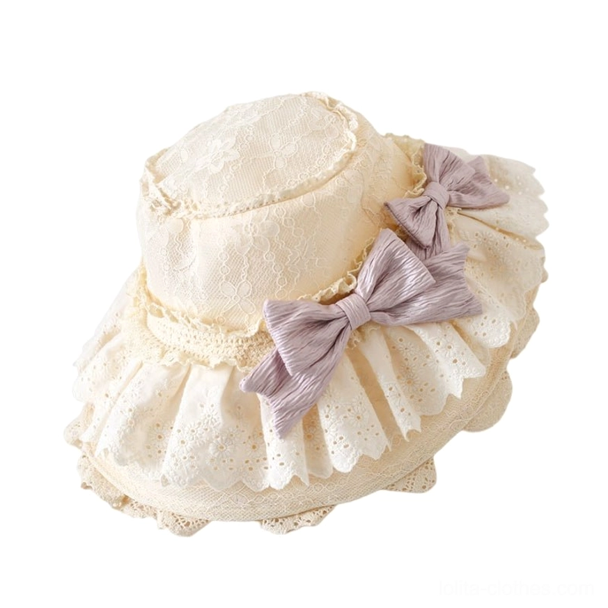 Beige lace Lolita sun hat with light purple bows top-down side view, overhead angle showing hat structure, brim width, and shapeable internal wire construction