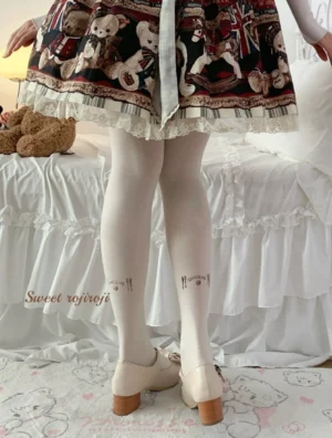 Cream white velvet lolita tattoo stockings back view calf print details model with plaid bear skirt beige block heel pumps