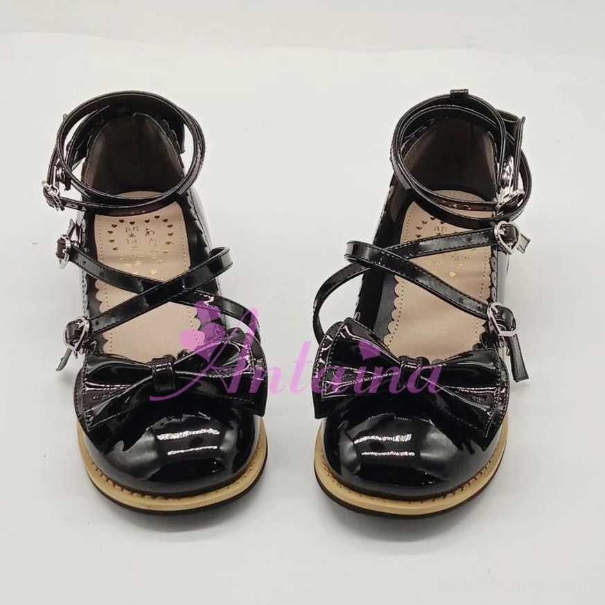 Elegant handcrafted lolita tea party shoes with round toe design, crossover ankle straps, and decorative bow ornament front view on white background