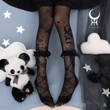 Close-up detail of lolita stereo floral tights ruffled lace ankle cuff with decorative bow and fluffy trim, showcasing architectural design element and premium lace construction quality