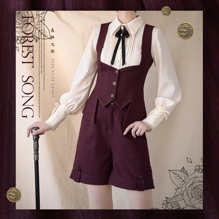 Lolita two-piece shorts set full-body front static display with white pointed collar shirt, burgundy pinstriped vest and shorts, black bow tie accessory, vintage decorative studio background