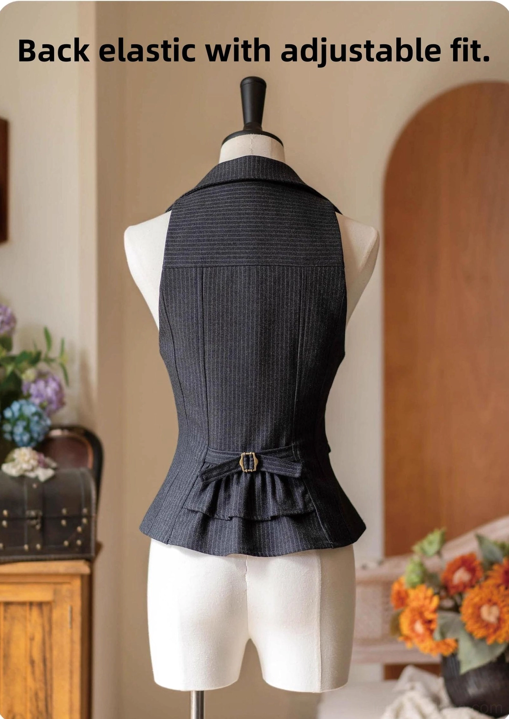 Classic lolita striped vest back view showing elastic waist system with adjustable metal buckle and ruffled peplum hem