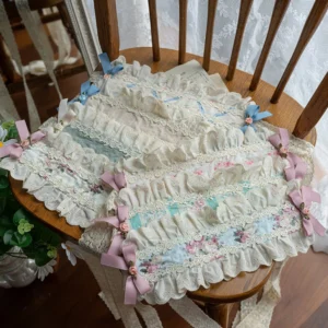 Delicate white frilled lace Lolita collar with pink and blue bows and tiny floral motifs, featuring long lace tying straps displayed on vintage wooden chair with sheer curtain backdrop