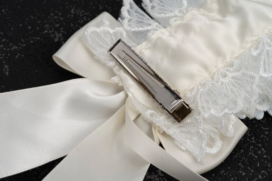 White lace gothic lolita angel wings hairband packaging and presentation, showing product in branded packaging ready for gifting or purchase