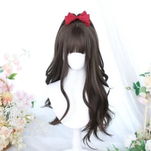 Lolita synthetic wig three-quarter view showcasing ash brown wavy texture, delicate air bangs, and elegant side styling with pearl accents against garden flower arrangement background