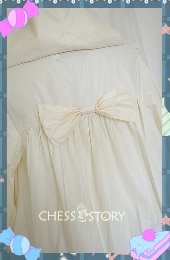 Close-up back bow detail cream Lolita windbreaker showing handmade large fabric bow gathered back fabric and soft matte texture