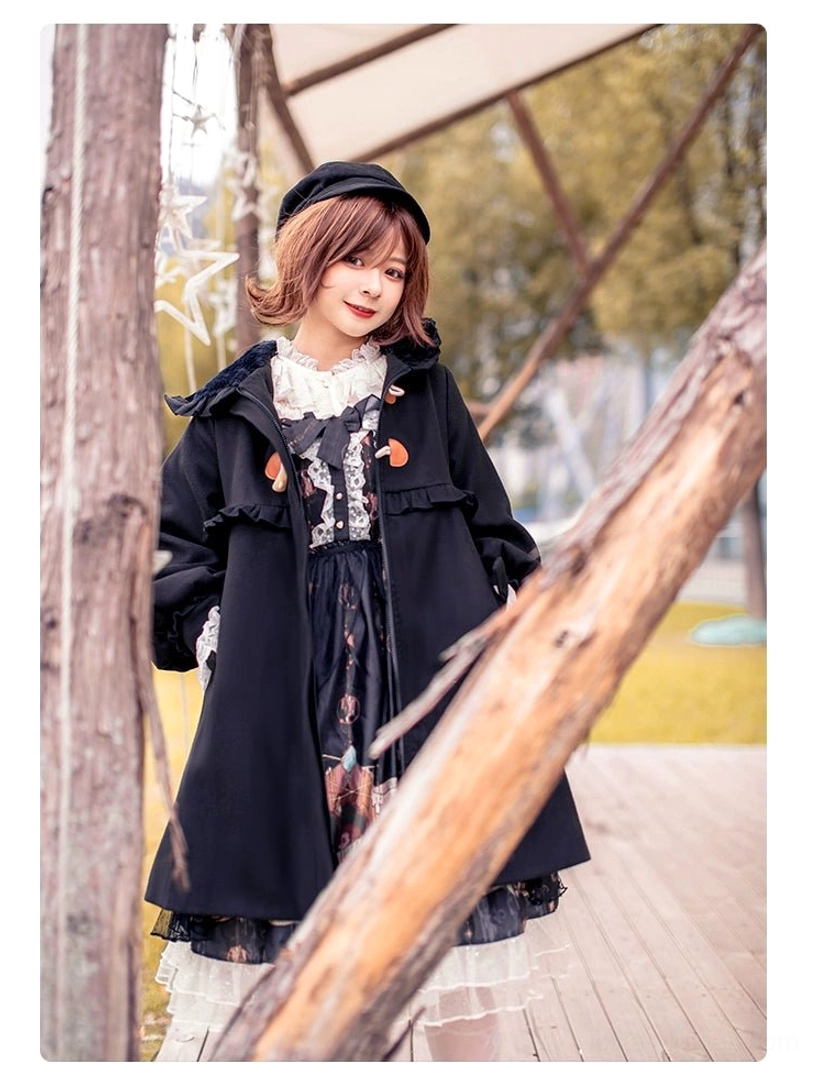 Lolita woolen coat shoulder and sleeve detail ruffled trim construction quality craftsmanship close up view