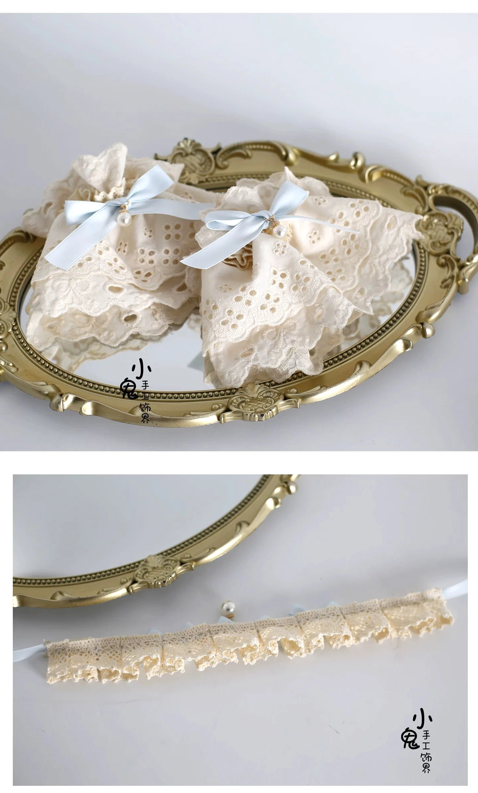 Pair of lolita wrist cuffs embroidered lace with sky blue bows displayed on vintage gold decorative tray flat lay styling