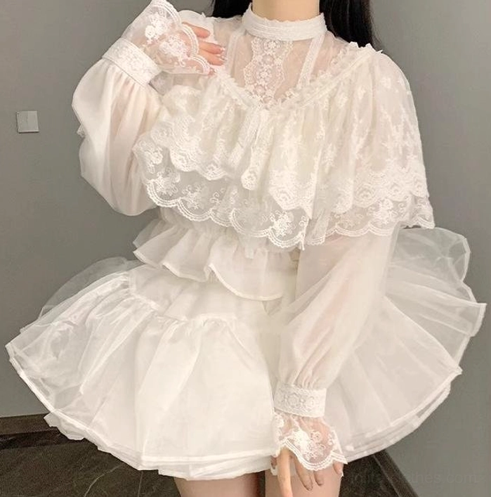 Love Poem pure white lolita ruffled blouse front three-quarter view layered lace chest ruffles lace-trimmed cuffs white skirt