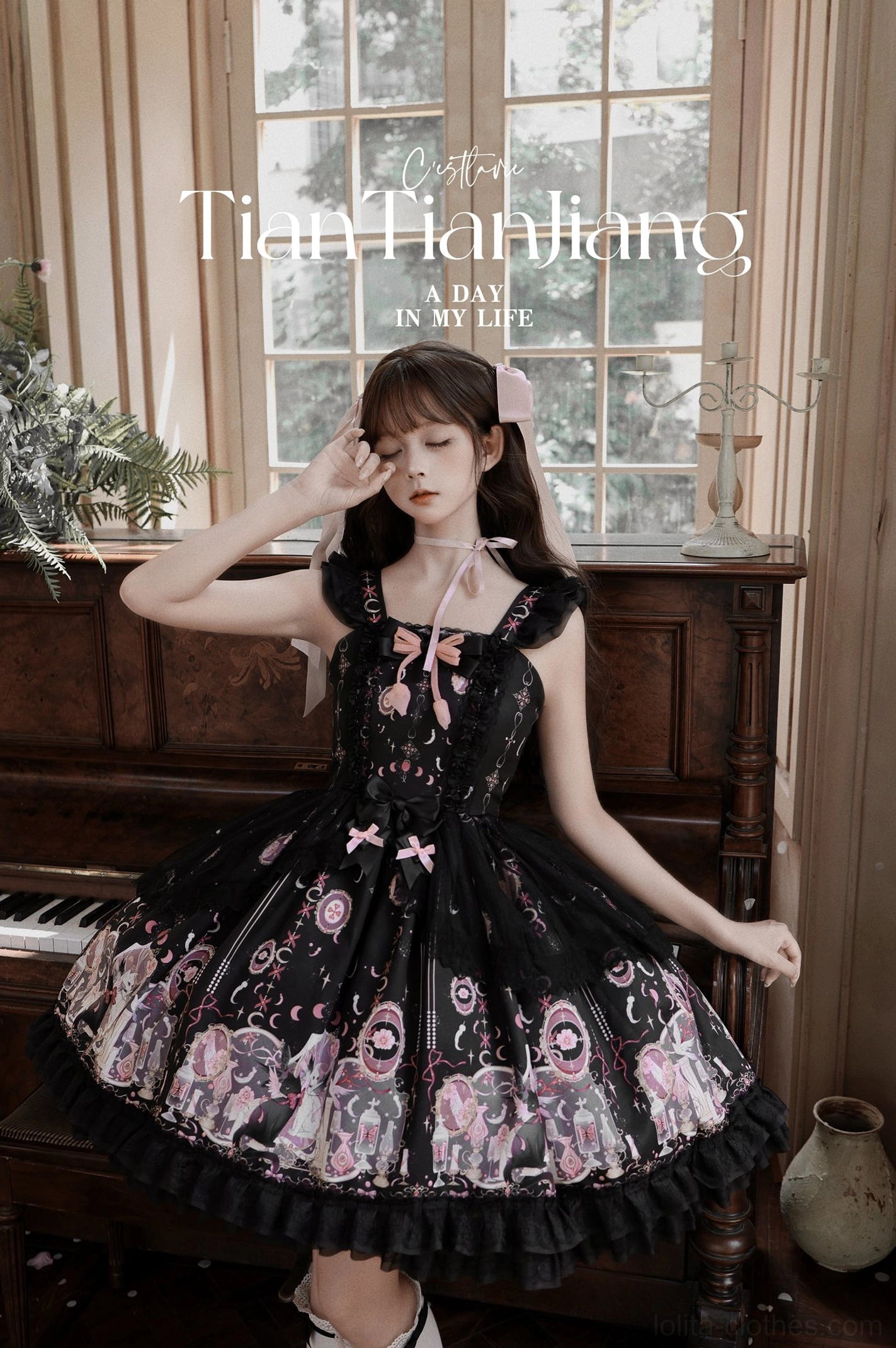 Lunar Cat Crown Sweet Lolita JSK Jumper Skirt - Front Three-Quarter Pose with Delicate Pink Bow Bodice Detail and Full A-Line Flared Skirt Design