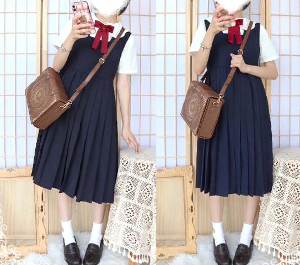 Magic book themed lolita crossbody bag close-up showing star-shaped magnetic buckle closures and premium leather construction details