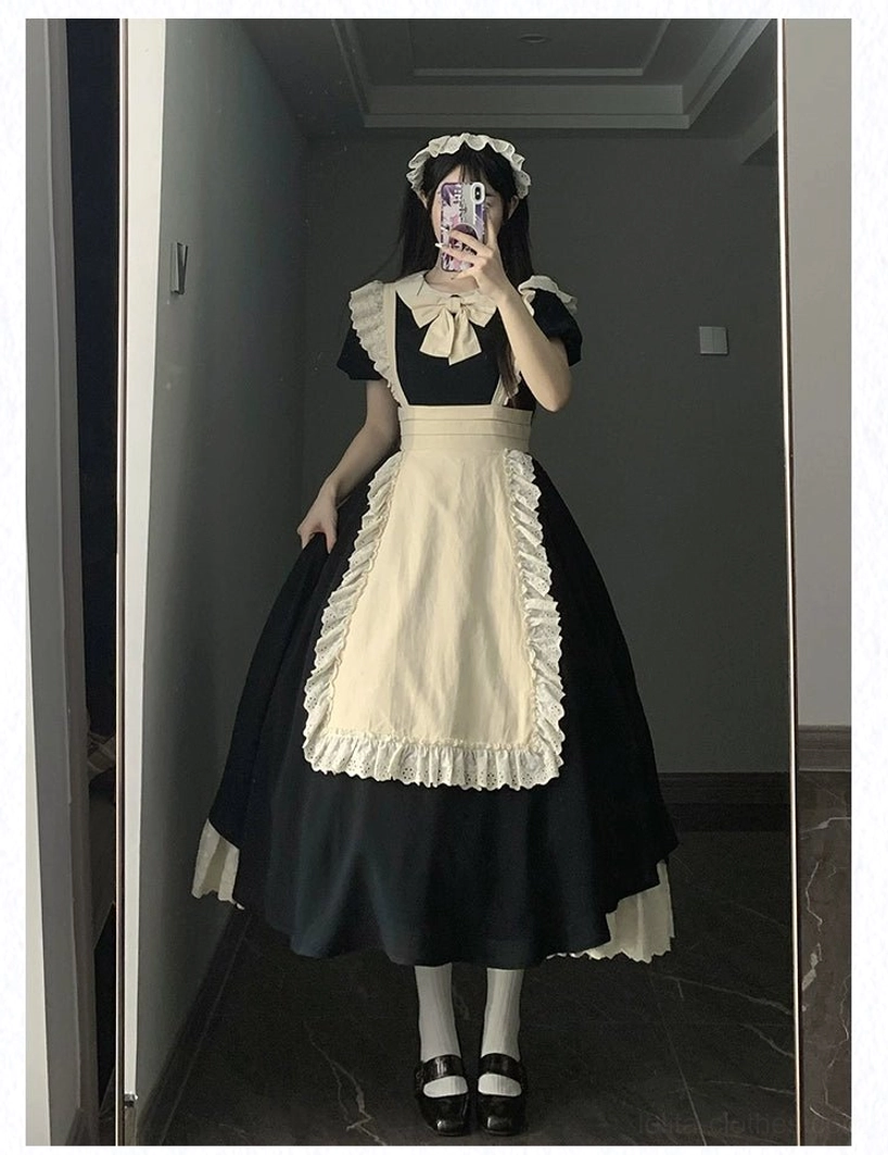 Vintage maid lolita OP dress showing back zip closure and back strap convertible design