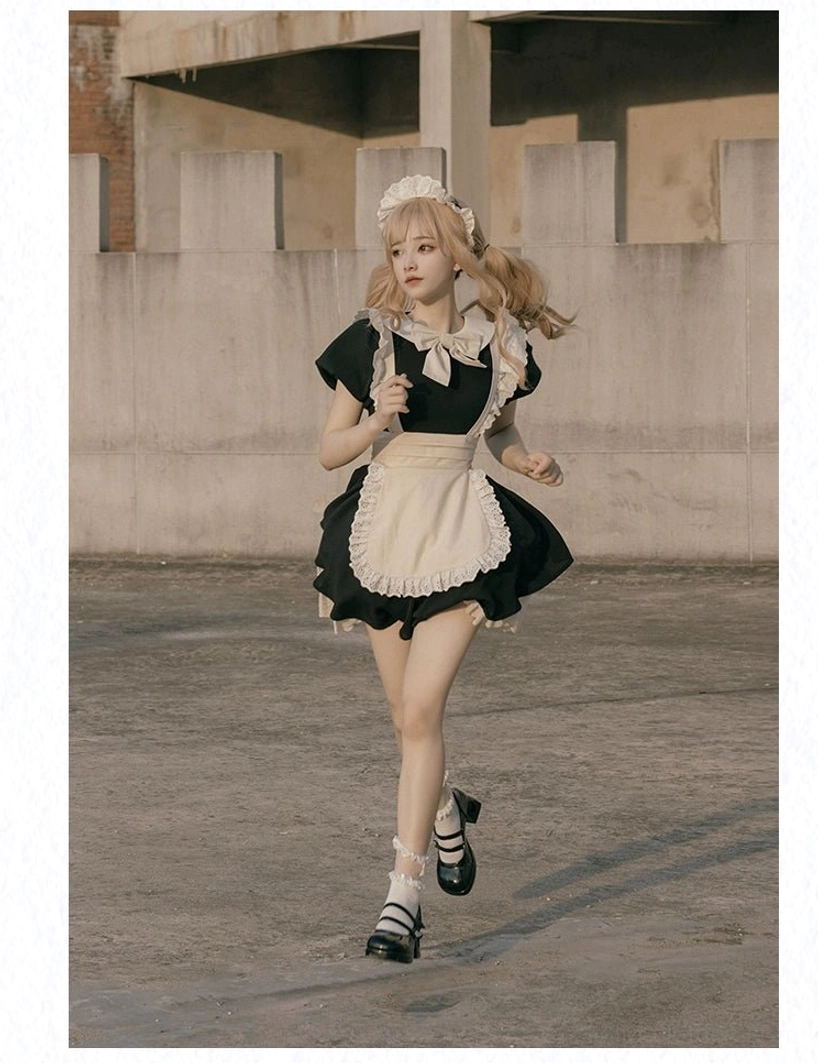 Maid lolita dress worn with coordinated accessories socks and Mary Jane shoes styling