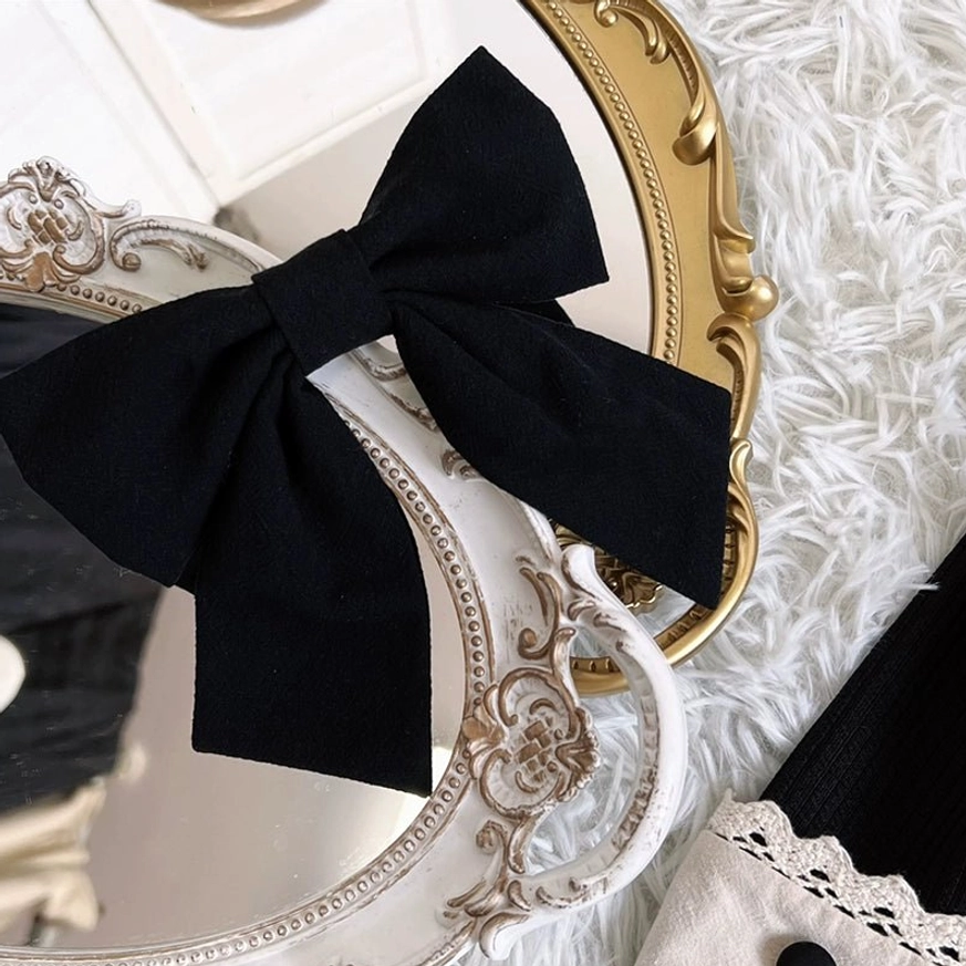 Maid lolita OP dress showing customizable strap configuration cross-back parallel options