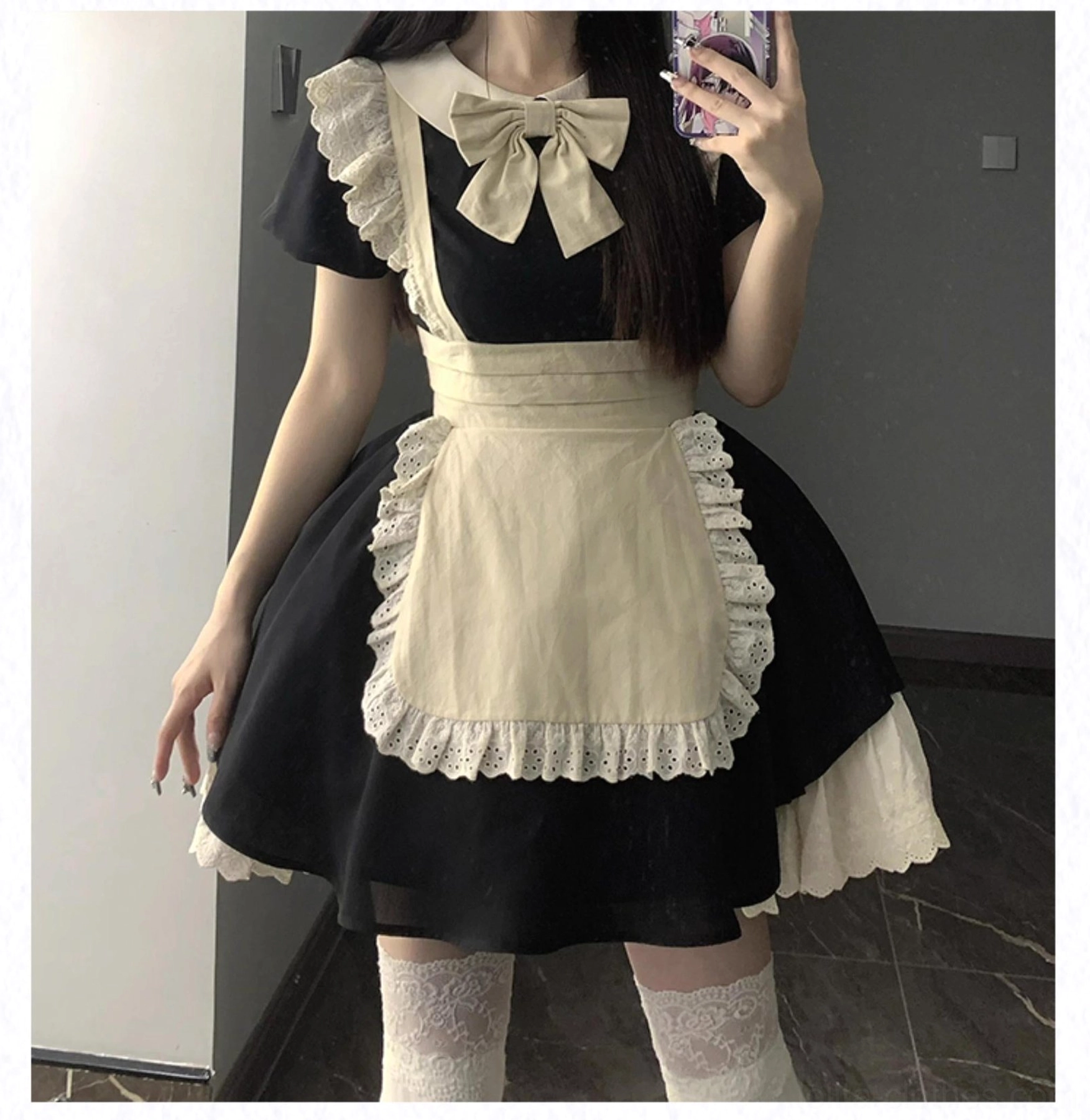 Maid lolita dress showing lace apron front layers and ruffles texture detail