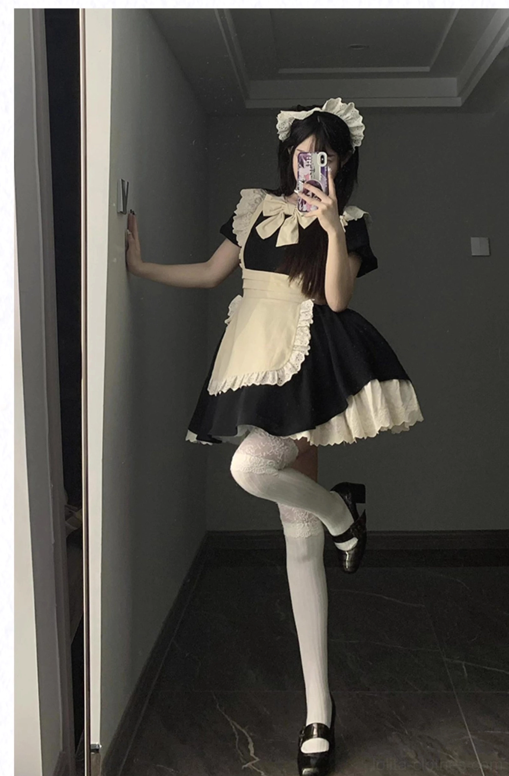 Maid lolita dress hem detail showing lace trim and skirt construction quality