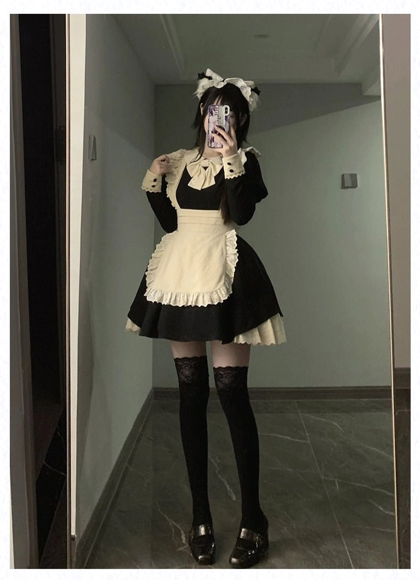 Maid lolita dress waistline showing integrated apron front and waist bow decoration
