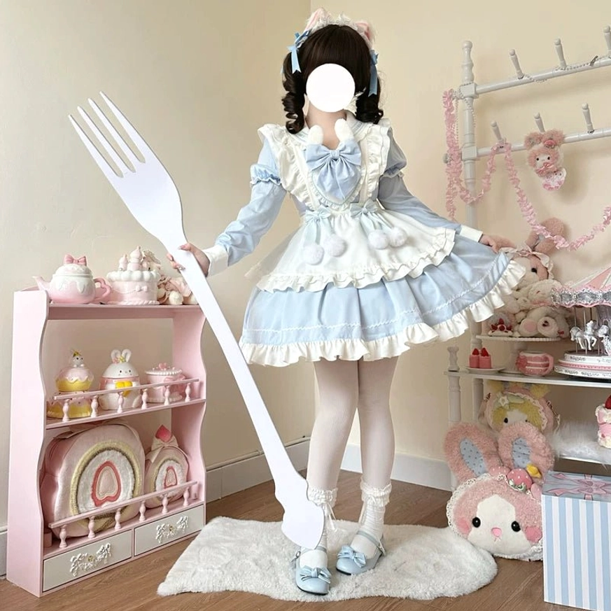 Bunny ear maid lolita OP dress back view showing shirring design, ruffled skirt construction, and overall silhouette, black and white color variant displayed